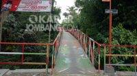 Jembatan Joko Soroh di Dusun Sedah, Desa Japanan, Kecamatan Mojowarno, Kabupaten Jombang, bisa jadi alternatif wisata. Lokasi ini cocok bagi yang suka berswafoto dengan latar panorama alam dan warna-warni. KabarJombang.com/Diana Kusuma/